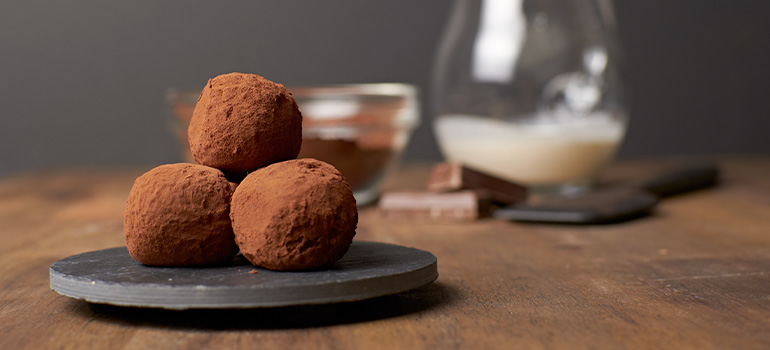 Chocolate truffles presented nicely on a plate